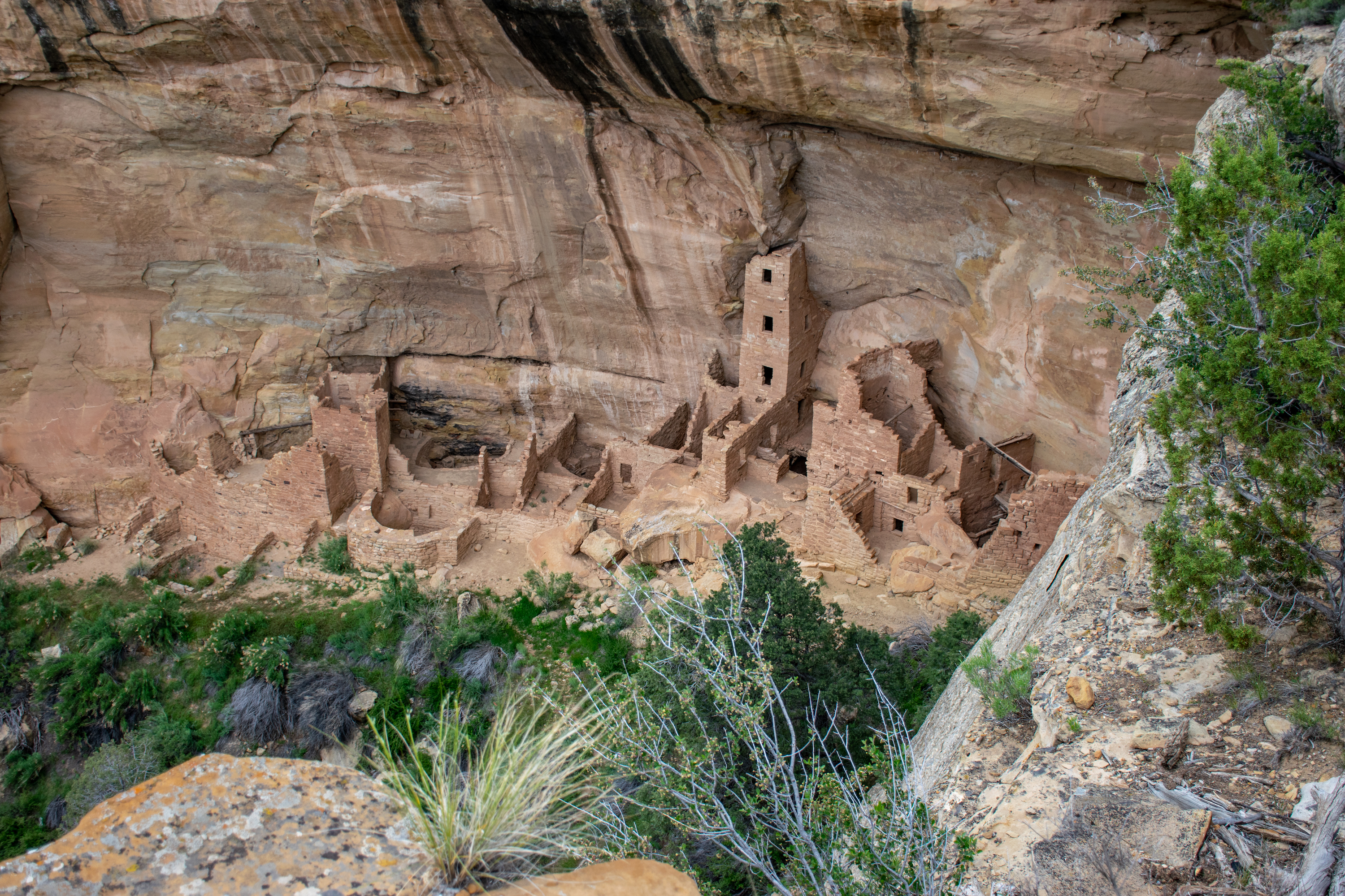 View looking down over a well preserved pueblo indian ruin