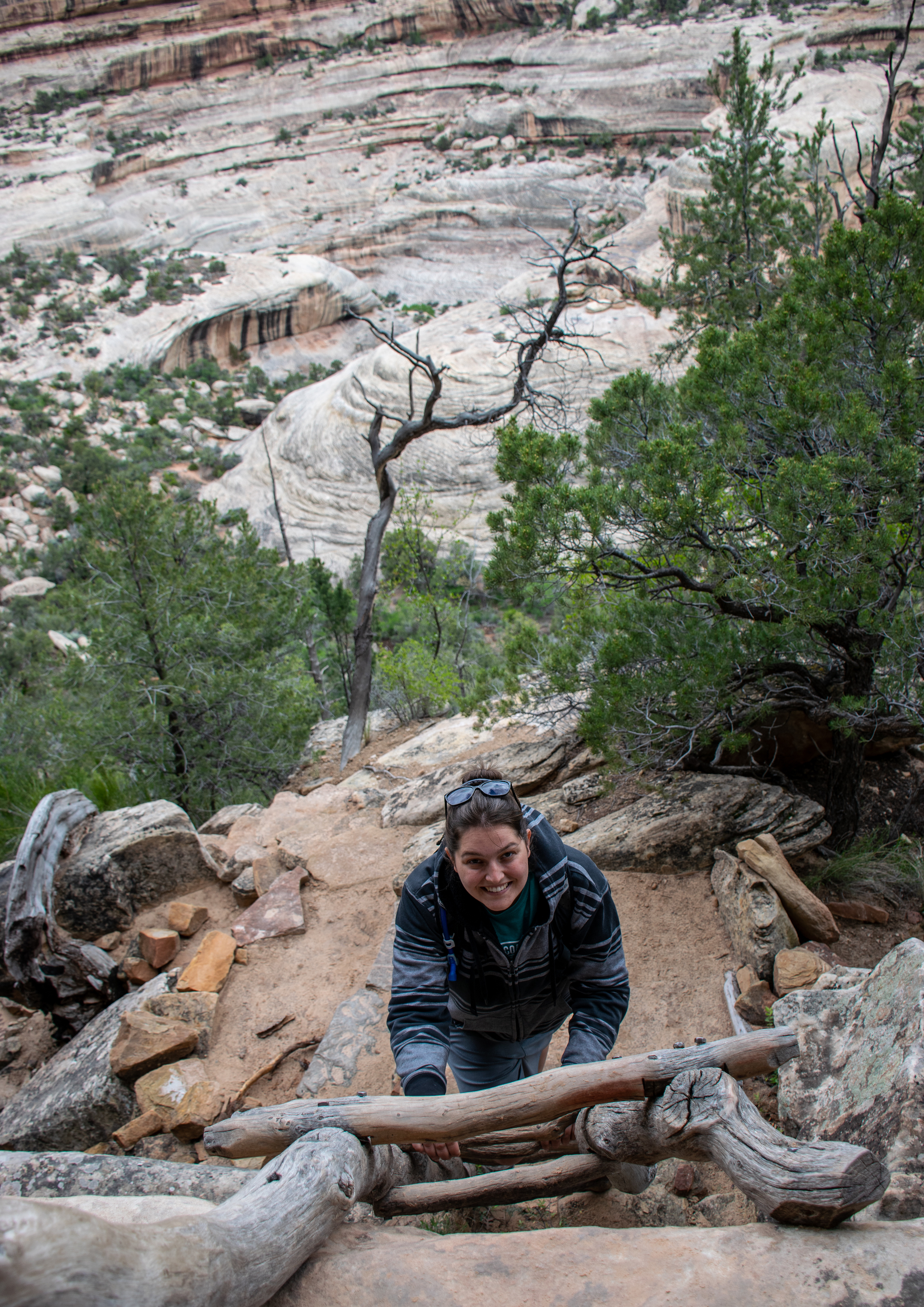 Me climbing down a ladder towards Sipapu Bridge